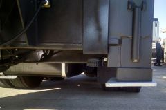 Stabilizer foot pads are angled slightly down toward the middle of the truck. During the winter, when you park the truck in your station, snow, ice and slush will melt and drain off the foot pad instead of melting there and causing the pad to rust.